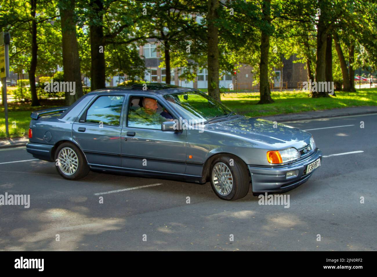 1988 80s, eighties Grey Ford Sierra Cosworth  RS COS SAP 1993cc petrol 5 speed manual; Cars and motorcycles on display at the 13th Lytham Hall Summer Classic Car & Motorcycle Show, a Classic Vintage Collectible Transport Festival. Stock Photo