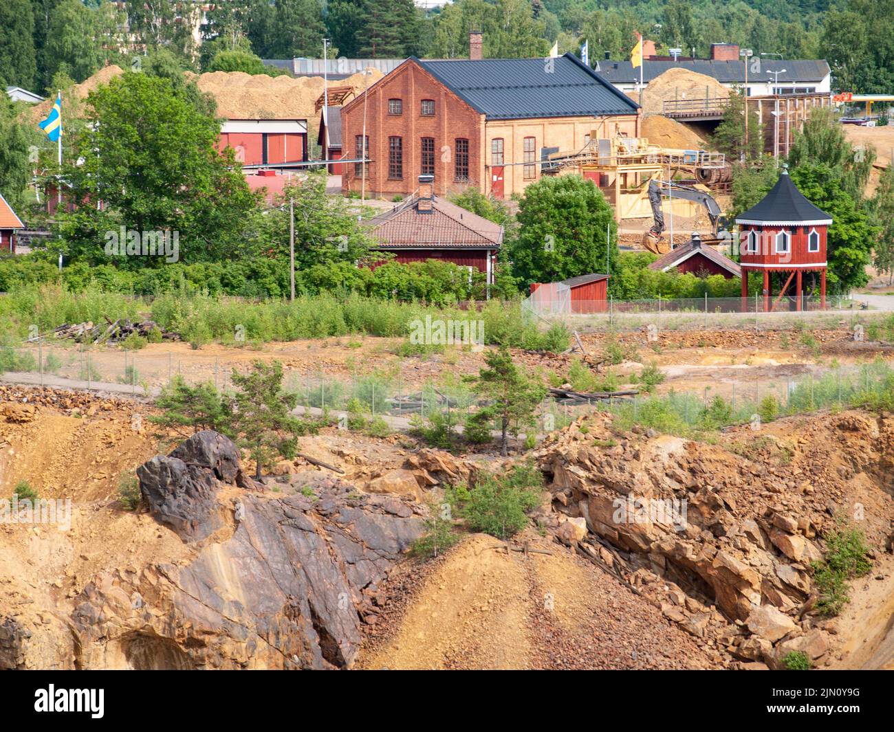 Falun Copper Mine the World Heritage with orange mountain visible and