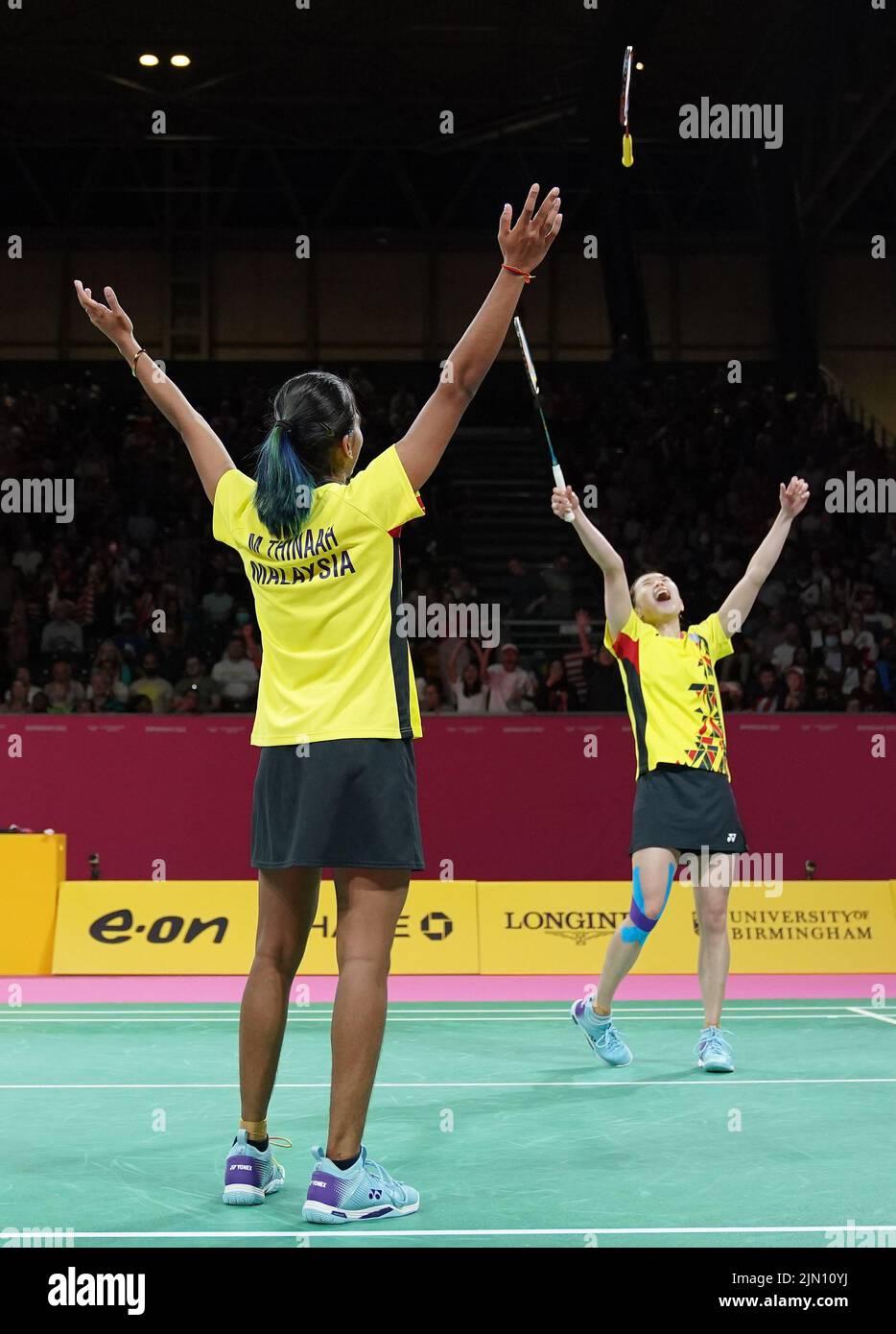 Malaysia's Muralitharan Thinaah and Koong Le Pearly Tan celebrate after  winning gold in the the Women's Doubles badminton at The NEC on day eleven  of the 2022 Commonwealth Games in Birmingham. Picture