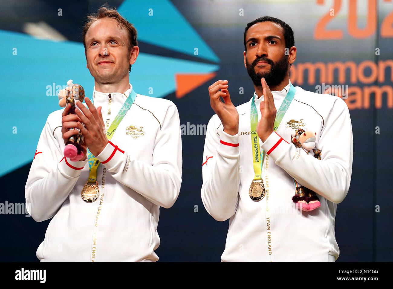 England's James Willstrop (left) and Declan James with the gold medal after the Men's Squash Doubles Medal match at the University of Birmingham Hockey and Squash Centre on day eleven of the 2022 Commonwealth Games in Birmingham. Picture date: Monday August 8, 2022. Stock Photo