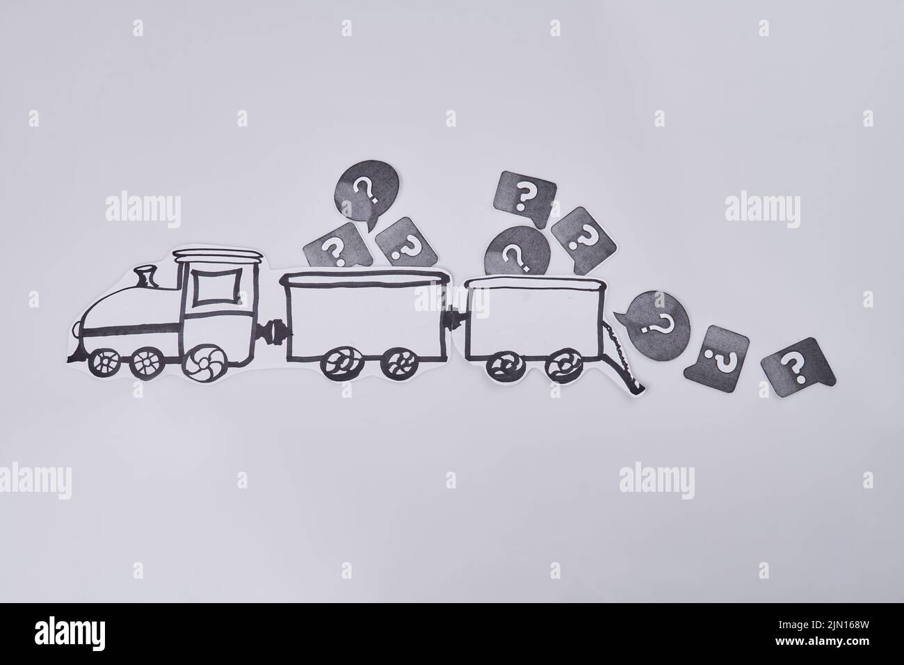 Drawn train with question signs on white background. Lots of questions