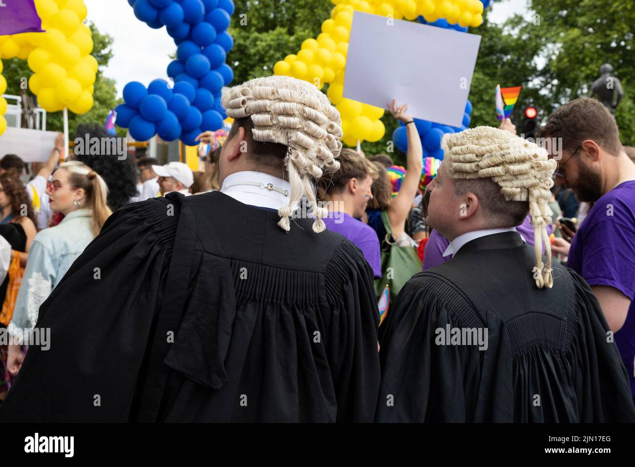 Barristers march as part of the Legal block at  London Pride 2022, dressed in traditional gowns and wigs Stock Photo