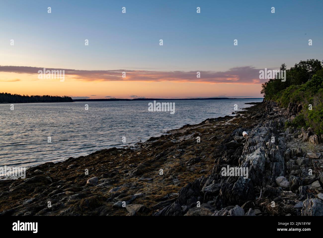 July 3, 2022.  View  from Barnes Island.  Casco Bay, Maine.  Whaleboat Island at left. Stock Photo