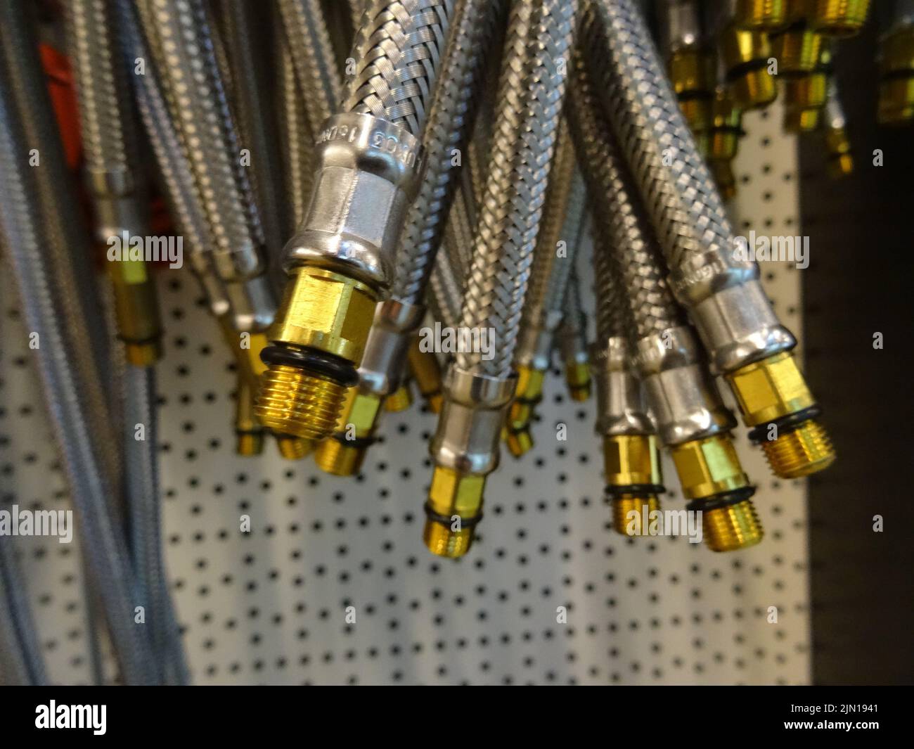Fittings Of A Drain Pressure Hoses On A Shelf At Sanitary Shop Stock