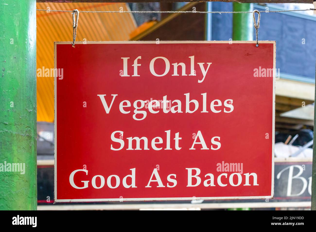 If only vegetables smelt as good as bacon market sign Stock Photo