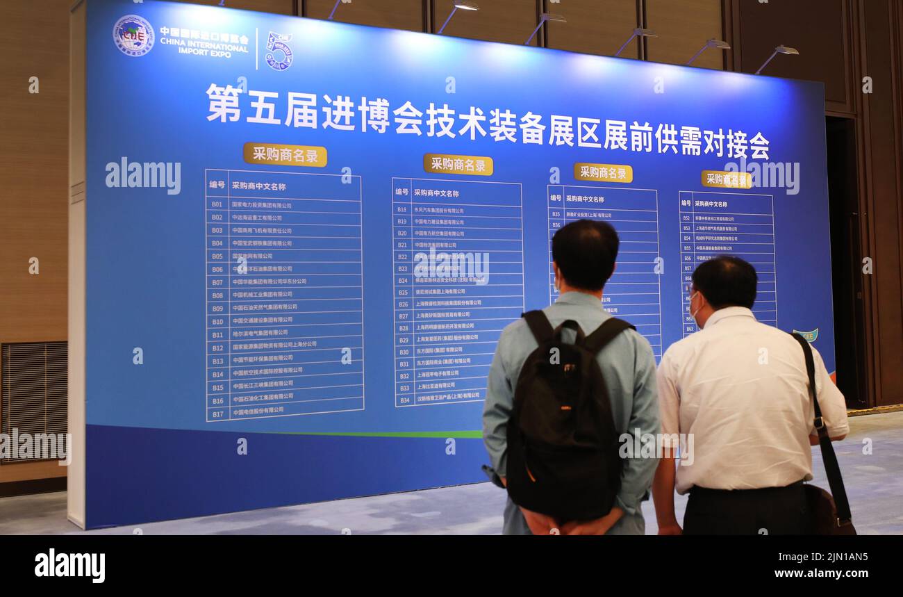 Shanghai. 8th Aug, 2022. Visitors look at a bulletin board showing a list of potential buyers during a pre-expo supply-demand matchmaking meeting for the Intelligent Industry & Information Technology Exhibition Area of the fifth China International Import Expo (CIIE) at the National Exhibition and Convention Center (Shanghai) in east China's Shanghai, Aug. 8, 2022. Credit: Fang Zhe/Xinhua/Alamy Live News Stock Photo