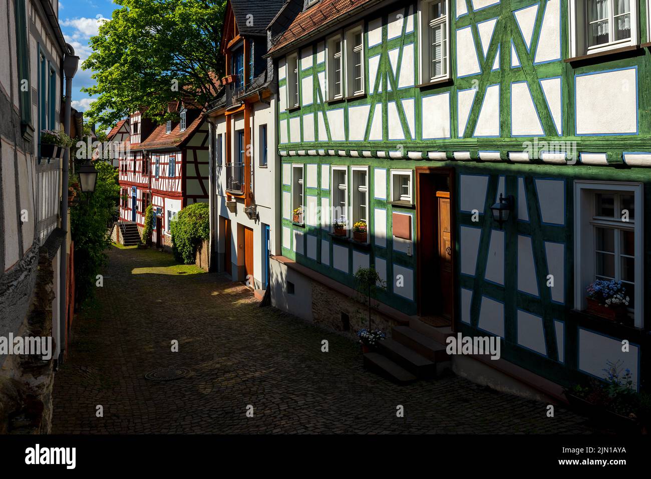 Cobblestone street in historic Idstein (typical German half-timbered town) Stock Photo