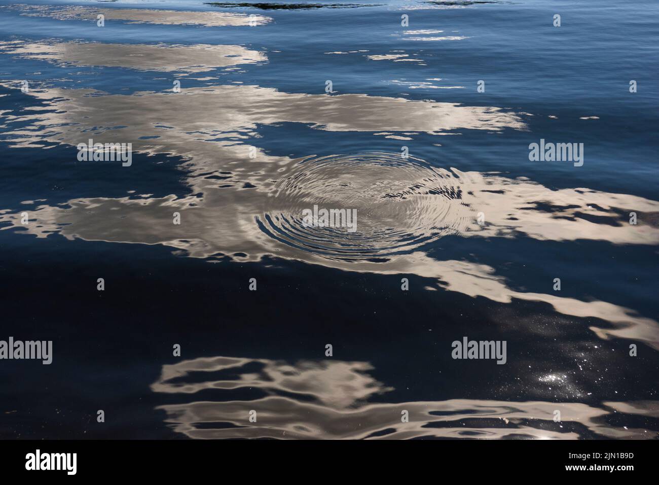 water ripples in the Kennebunk river in Hallowell Maine Stock Photo
