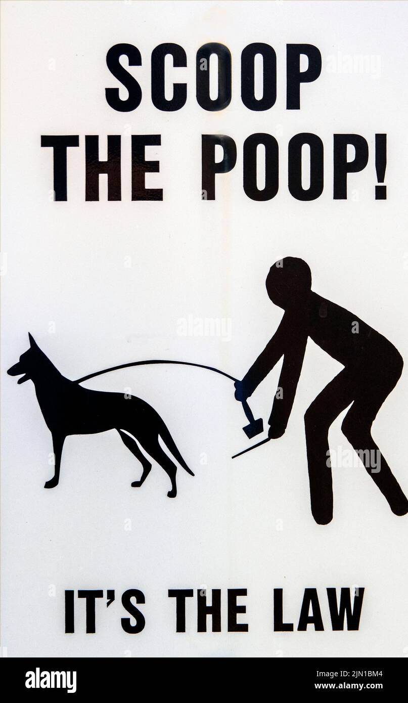 scoop the poop it's the law sign in Maine Stock Photo