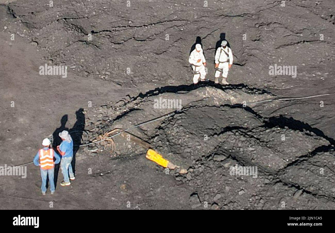 Soldiers move next to the mine shaft of a coal mine that collapsed leaving miners trapped, in Sabinas, in Coahuila state, Mexico, August 8, 2022. REUTERS/Luis Cortes Stock Photo