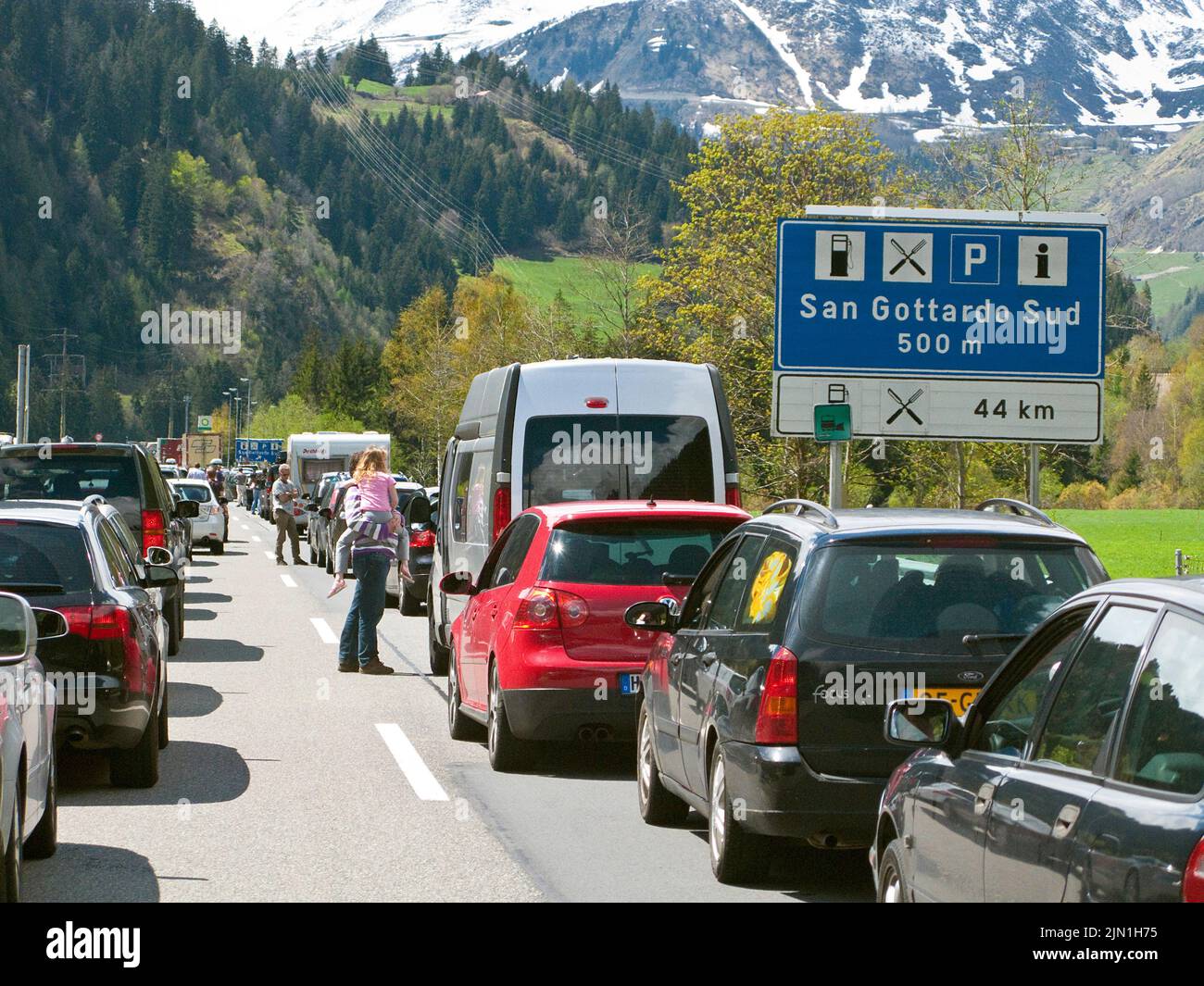 Line of cars, traffic jam on the highway at San Gotthard tunnel, Switzerland, Europe Stock Photo