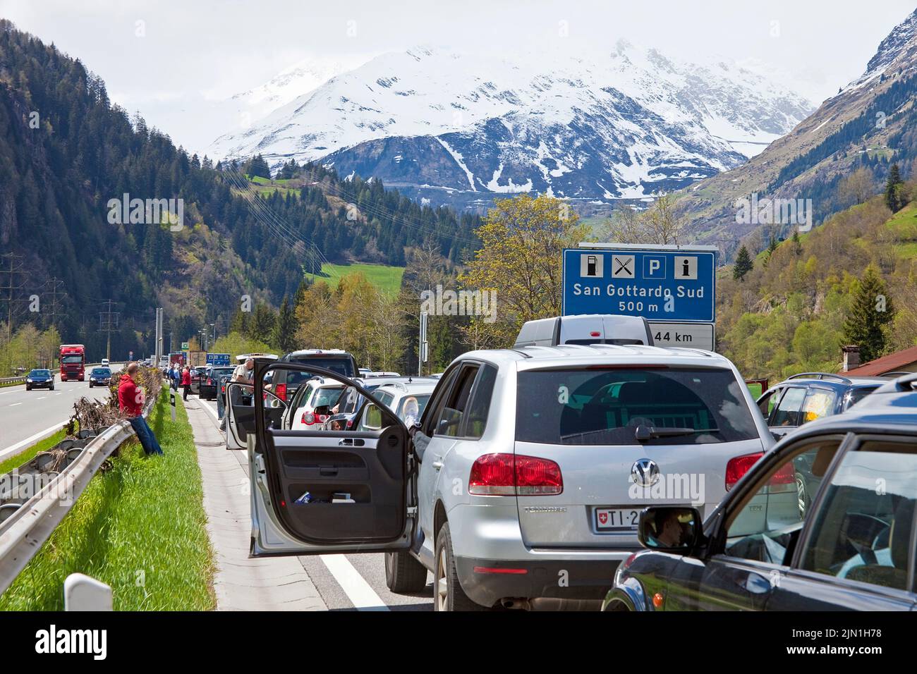 Line of cars, traffic jam on the highway at San Gotthard tunnel ...