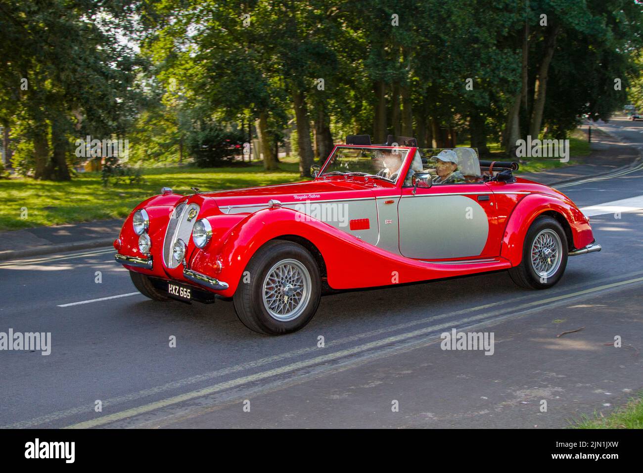 2019 red ROYALE SABRE, 1940s style open top tourer  SVA passed?  2936cc petrol coupe; Collectable cars are travelling to display at the 13th Lytham Hall Summer Classic Car & Motorcycle Show, a Classic Vintage Collectible Transport Festival. Stock Photo