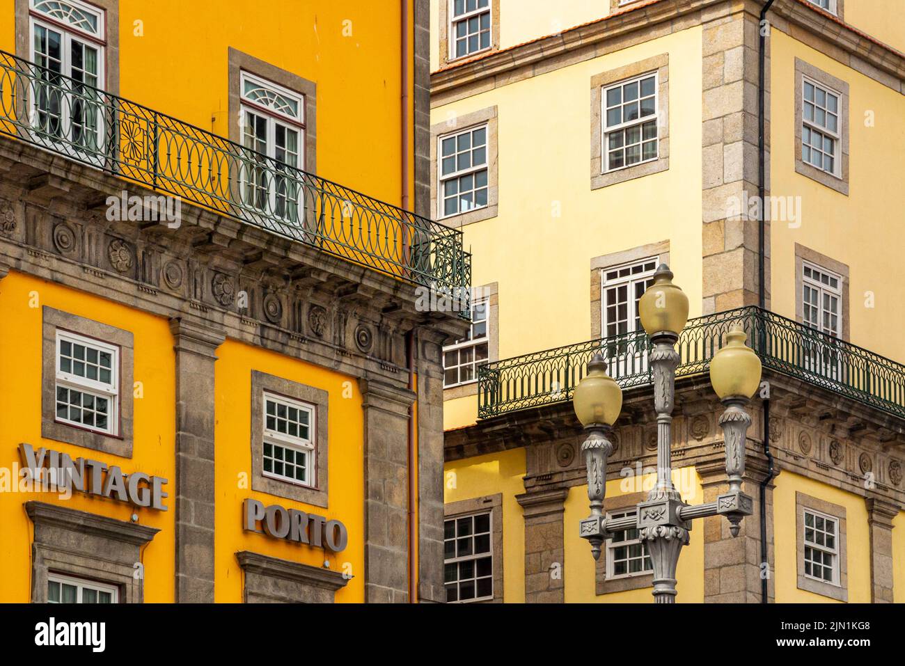 Traditional buildings with wrought iron balconies in the centre of Porto a major city in northern Portugal. Stock Photo