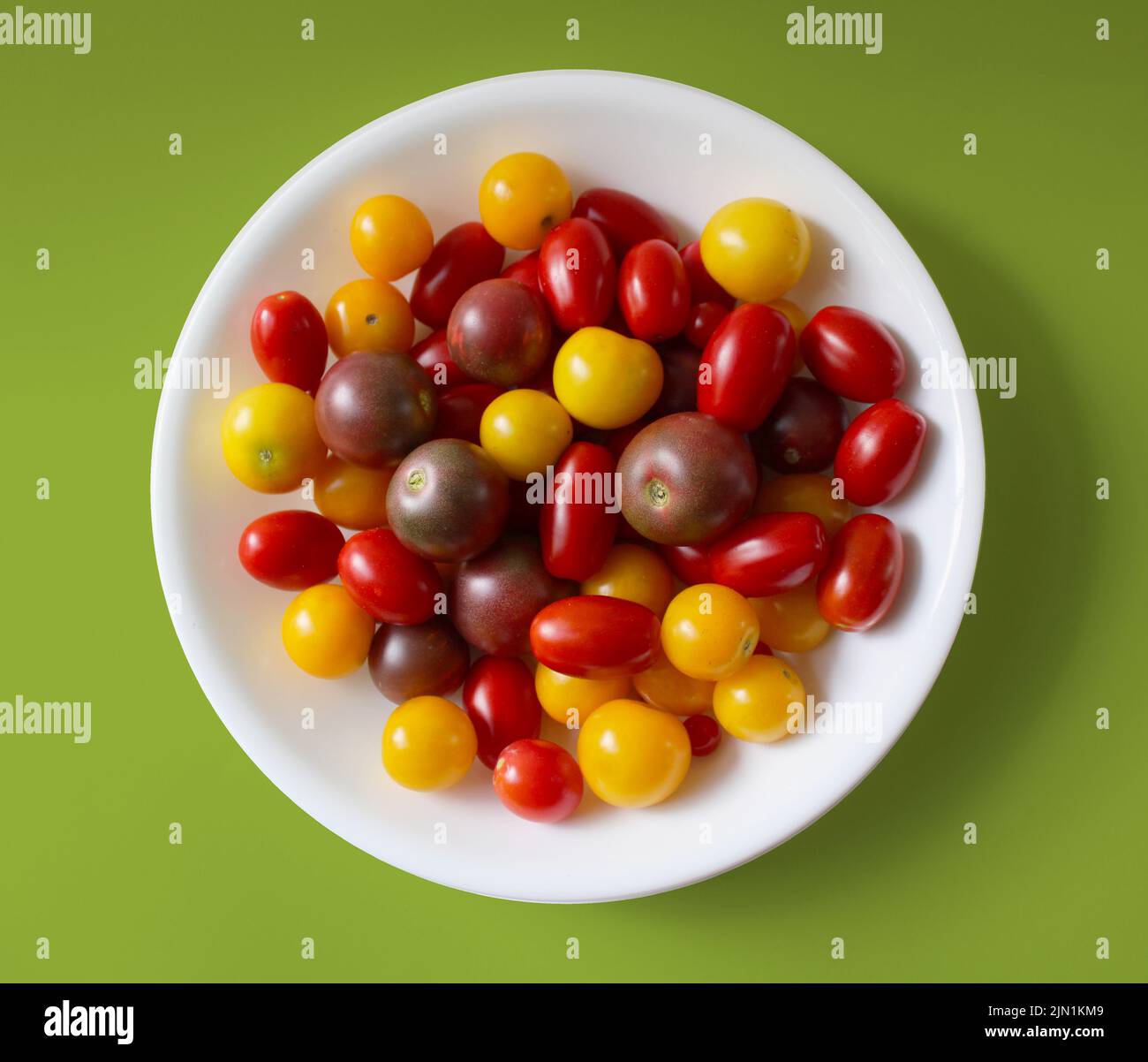 A Bowl Full of Colorful Cherry and Grape Tomatoes Stock Photo