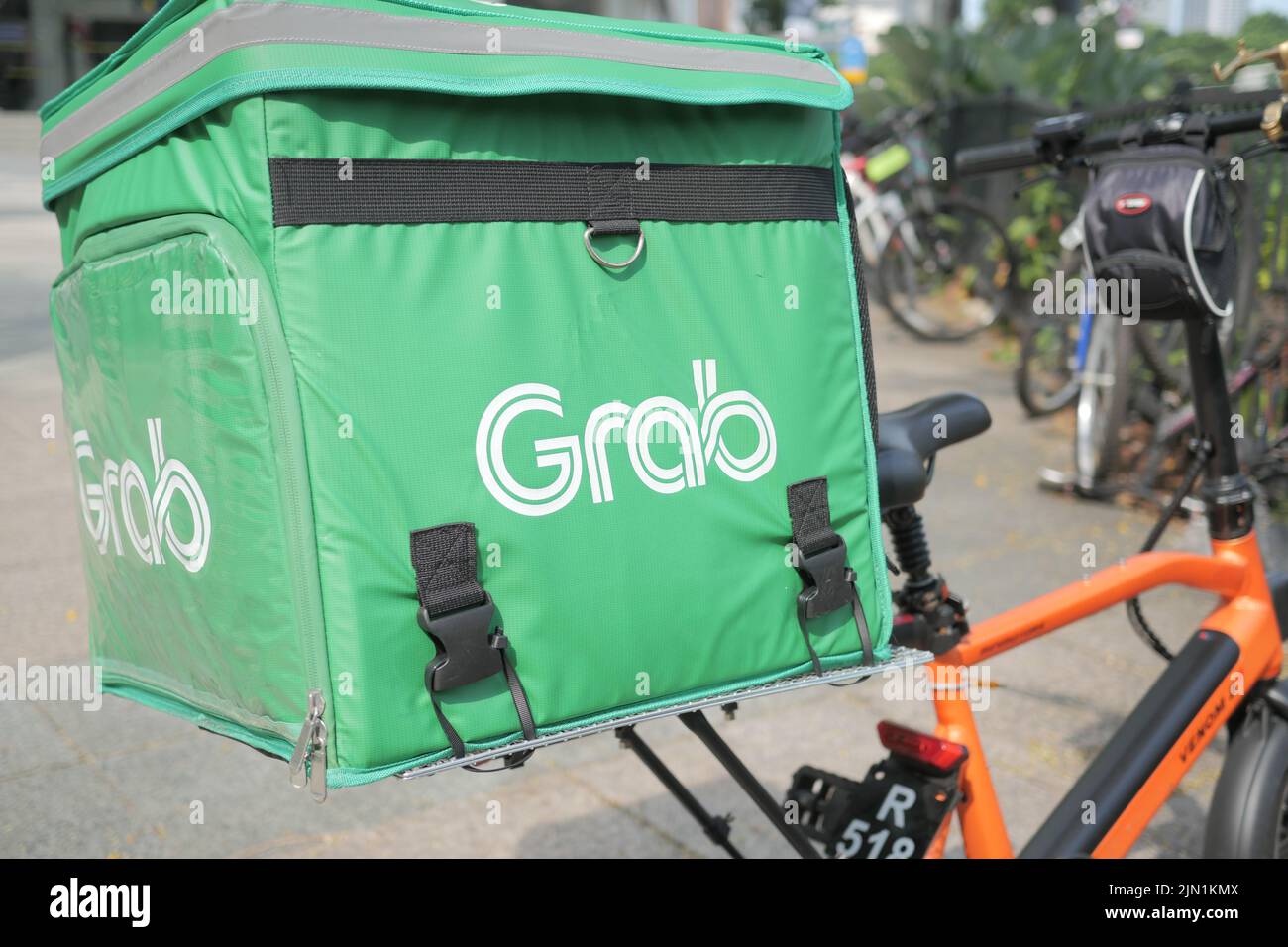 Singapore 1 june 2022. Grab Food logo on delivery bag  Stock Photo