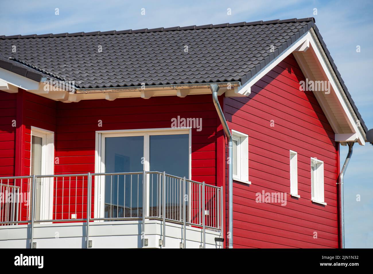 New red wooden house in Scandinavian style Stock Photo