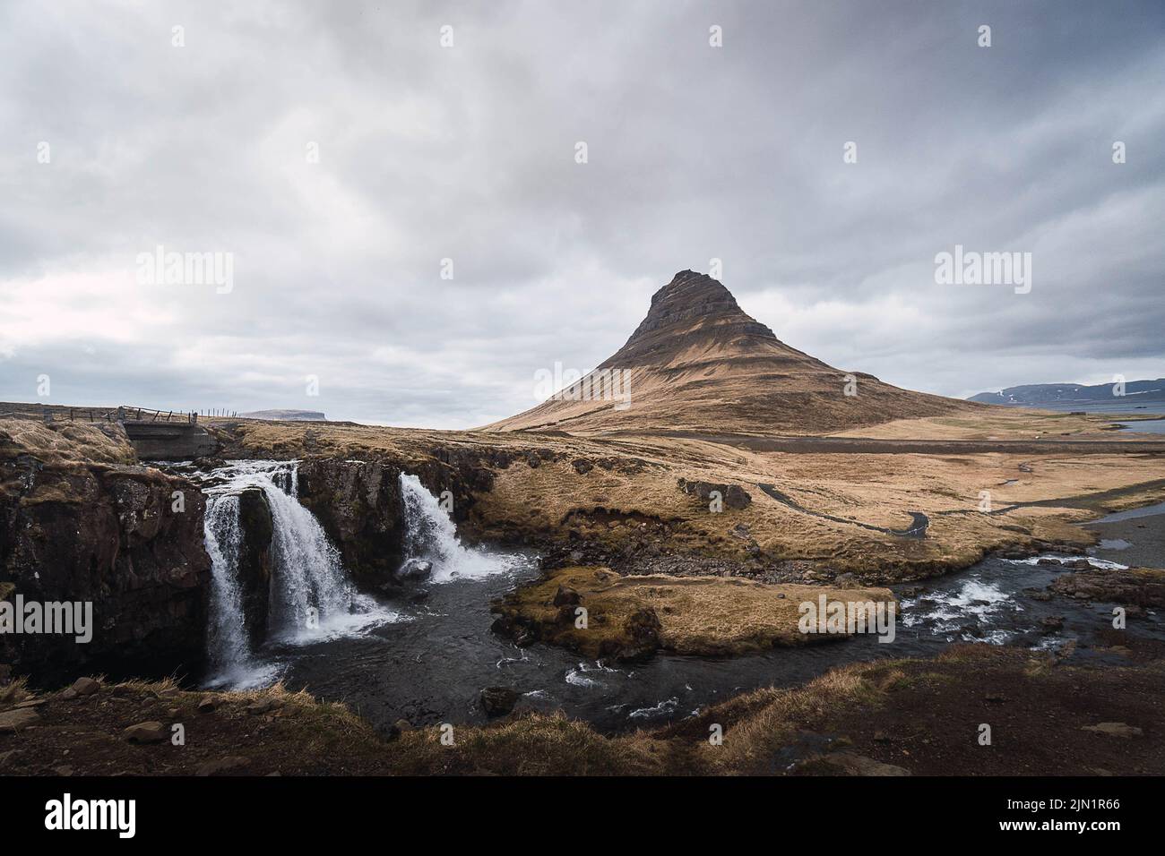 mountain by waterfall in Kirkjufell Stock Photo