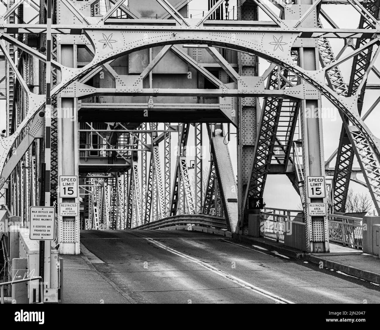 A road surrounded by steel bridge in black and white Stock Photo Alamy
