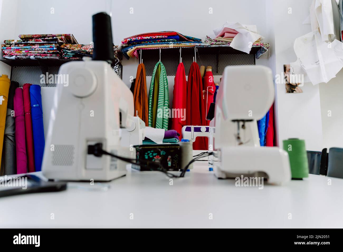 Seamstress dressmaker dressmaking machine design hi-res stock ...