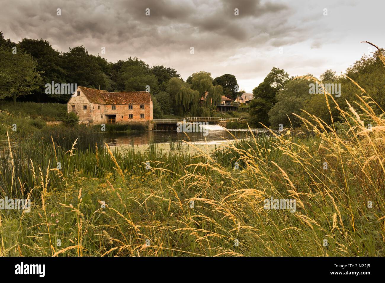 Sturminster Mill is a working flour mill located on the River Stour in Sturminster Newton Dorset UK and is mentioned in the Domesday book of 1086. Stock Photo