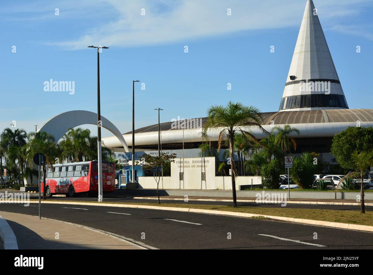 Facade of a bus station, in a city in the interior of the State of São Paulo, Brazil, South America, with pyramid construction, street in the foregro Stock Photo