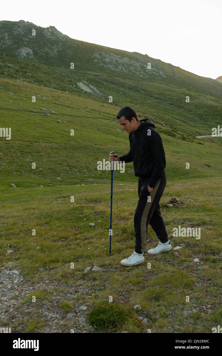 Young adult man walking on hi-res stock photography and images - Alamy