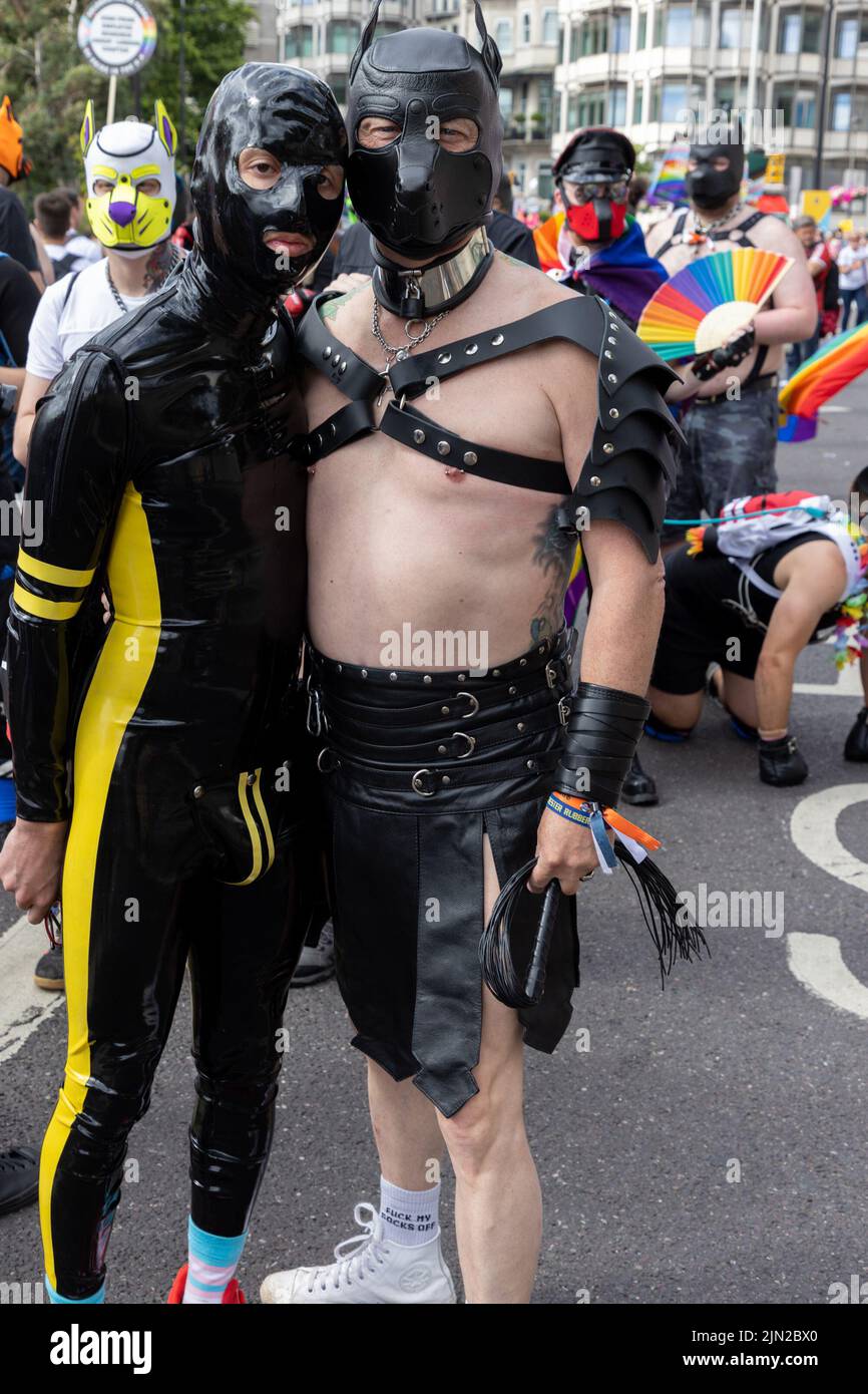 Men dress up in bondage leather costumes as part of London Pride, in Piccadilly. The annual march is a celebration for the lesbian, gay, bi-sexual, tr Stock Photo