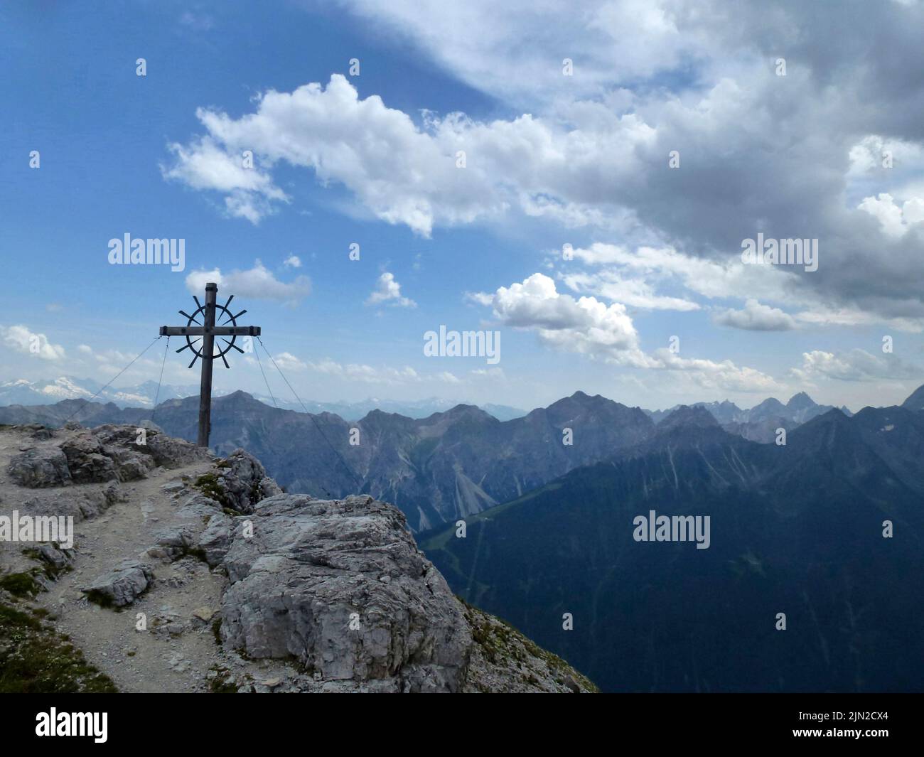 Summit cross Hoher Burgstall mountain at Stubai high-altitude hiking trail, lap 1 in Tyrol, Austria Stock Photo
