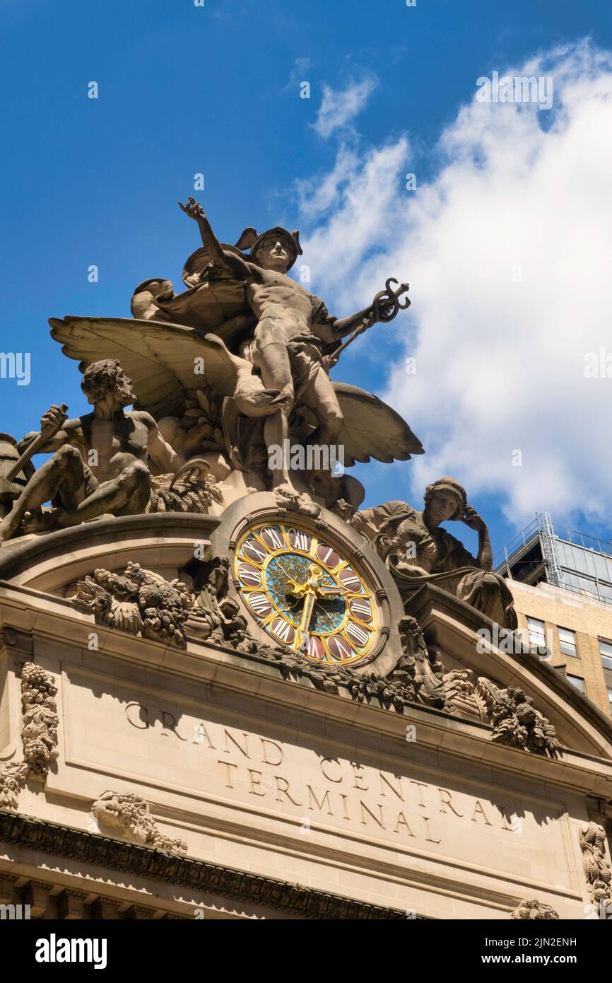 The facade of Grand Central Terminal features a transportation sculpture and a Tiffany glass clock, New York City, USA  2022 Stock Photo