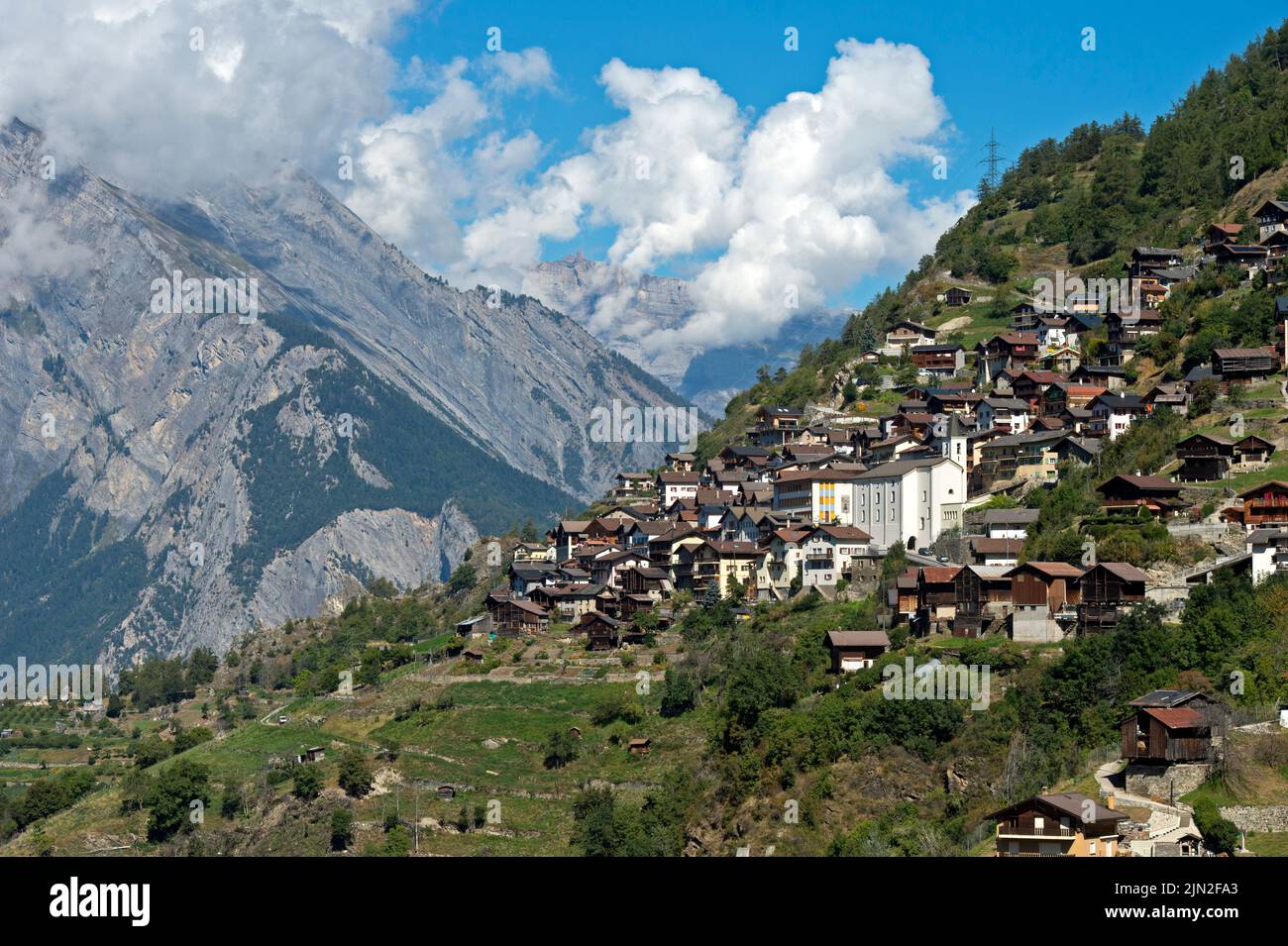 The 'hanging village' of Iserables above the Rhone valley, Iserables, Valais, Switzerland Stock Photo