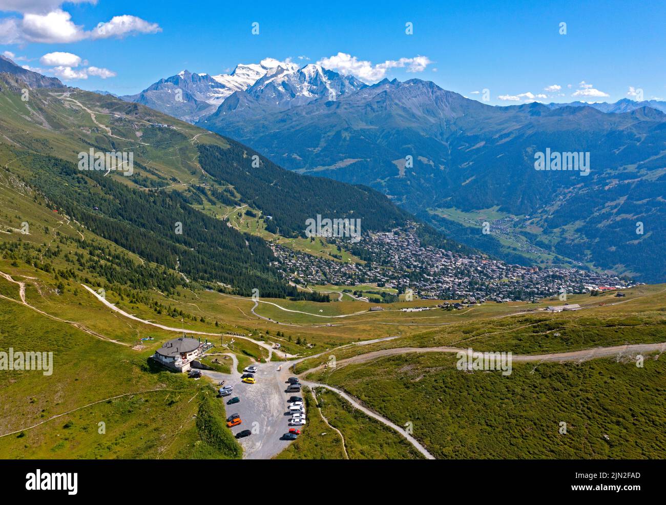 On the Col de la Croix de Coeur mountain pass, view of the town of Verbier and the Grand Combin peak, Verbier, Valais, Switzerland Stock Photo