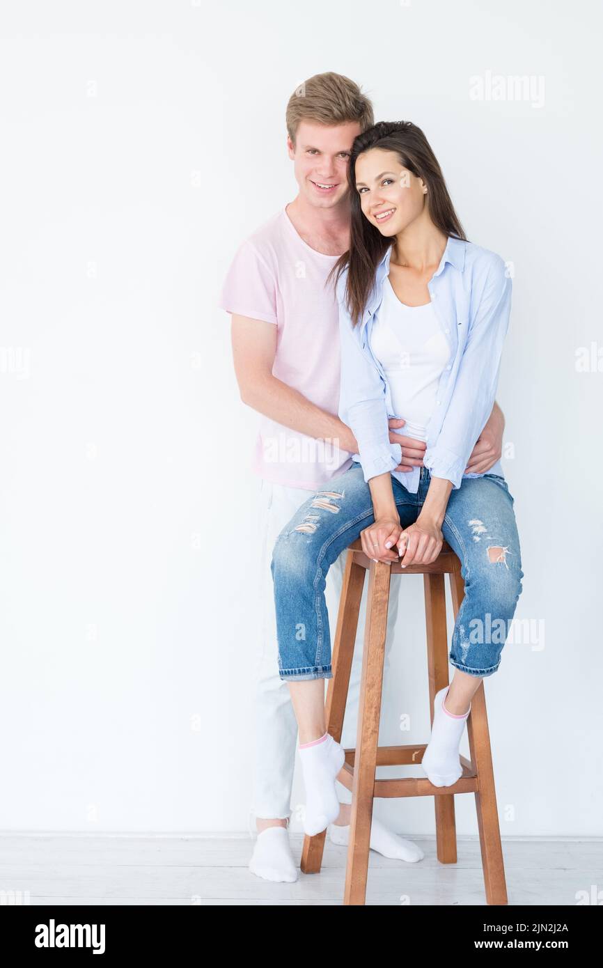 Man and woman smiling hi-res stock photography and images - Alamy