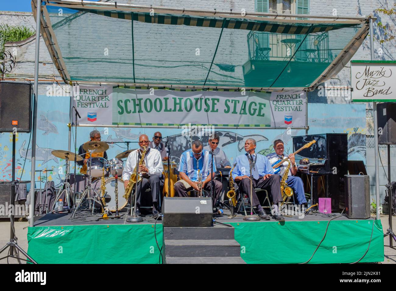 NEW ORLEANS, LA, USA - APRIL 9, 2017: The Muzik Jazz Band performs on the Schoolhouse Stage at the free French Quarter Festival Stock Photo