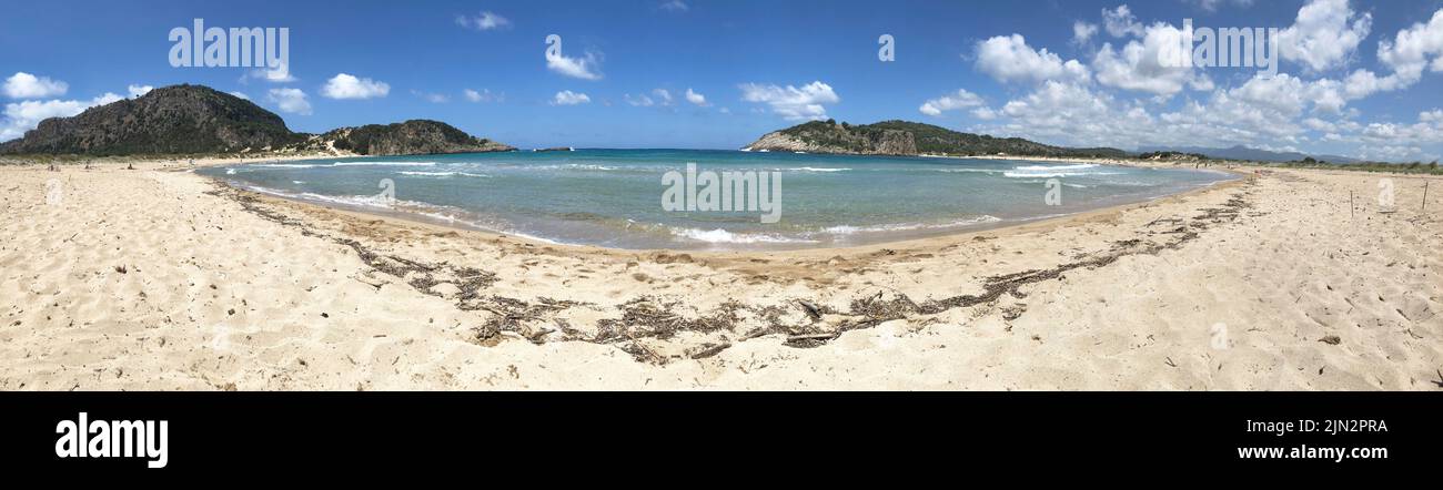 Panoramic view of Voidokilia bay at summer located at Messenia, Peloponnese, Greece. Blue sky with clouds and sea Stock Photo