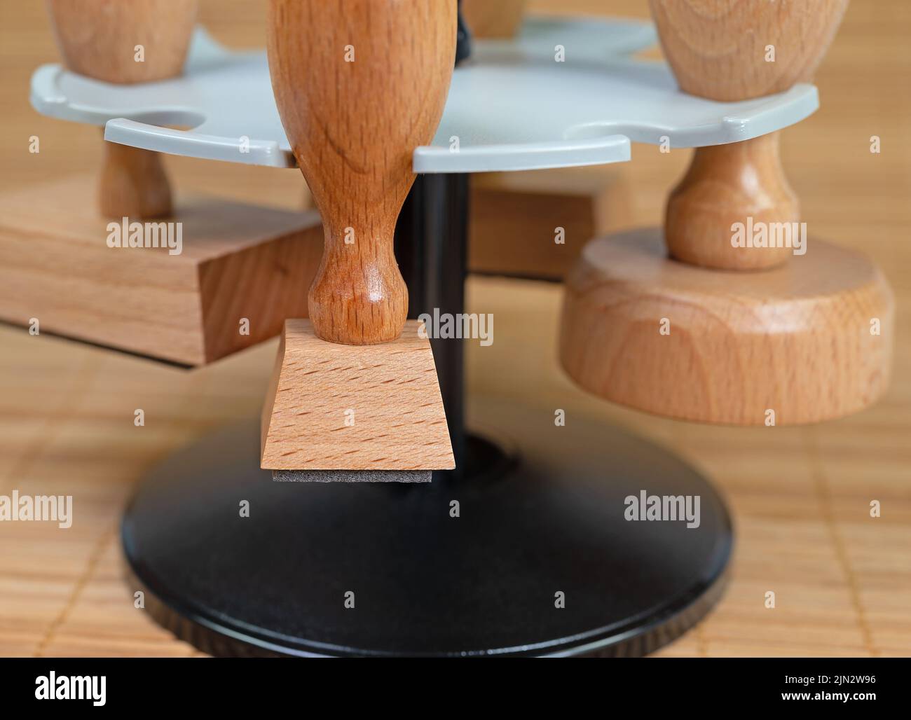 Various wooden stamps in stamp holder Stock Photo Alamy