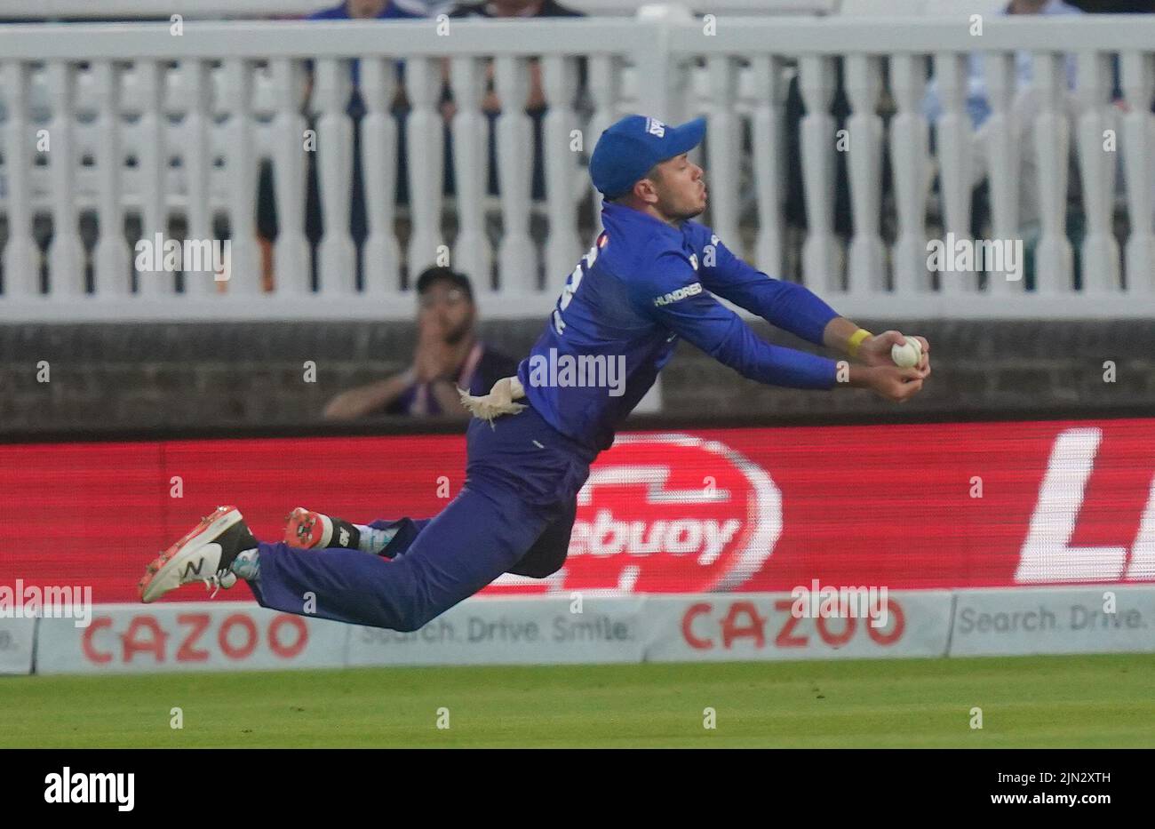 London Spirit's Mason Crane takes a catch of Manchester Original's Jos Buttler during The Hundred match at Lord's, London. Picture date: Monday August 8, 2022. Stock Photo