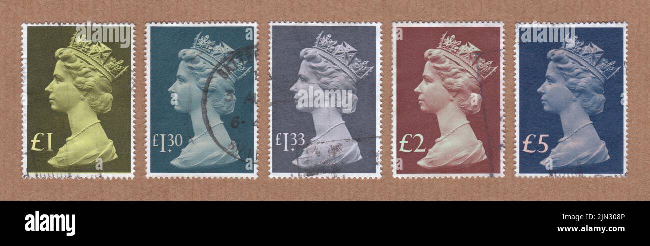 Collection of tall format, high value, British Royal Mail postal service, stamps. Queen Elizabeth II, Machin decimal definitive. First issued 1977 Stock Photo