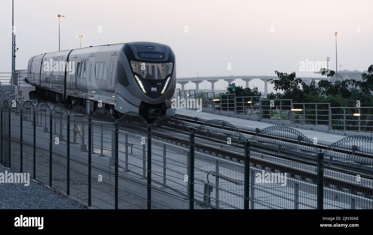 Doha, Qatar- June 06,2022 :Qatar red line metro traveling through the ...