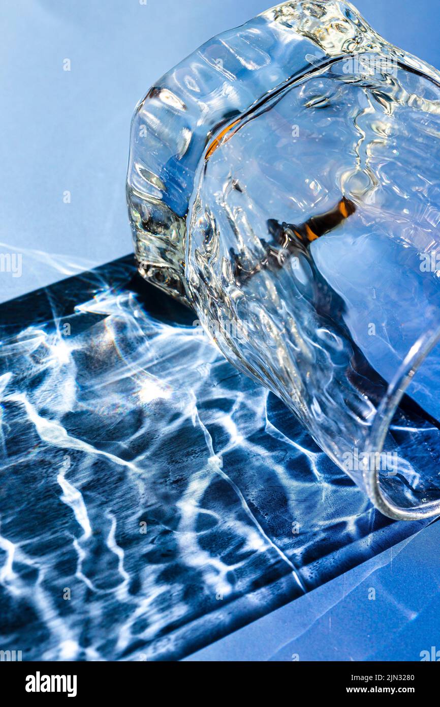 Beautiful caustic effect as light passes through a glass. Restaurant