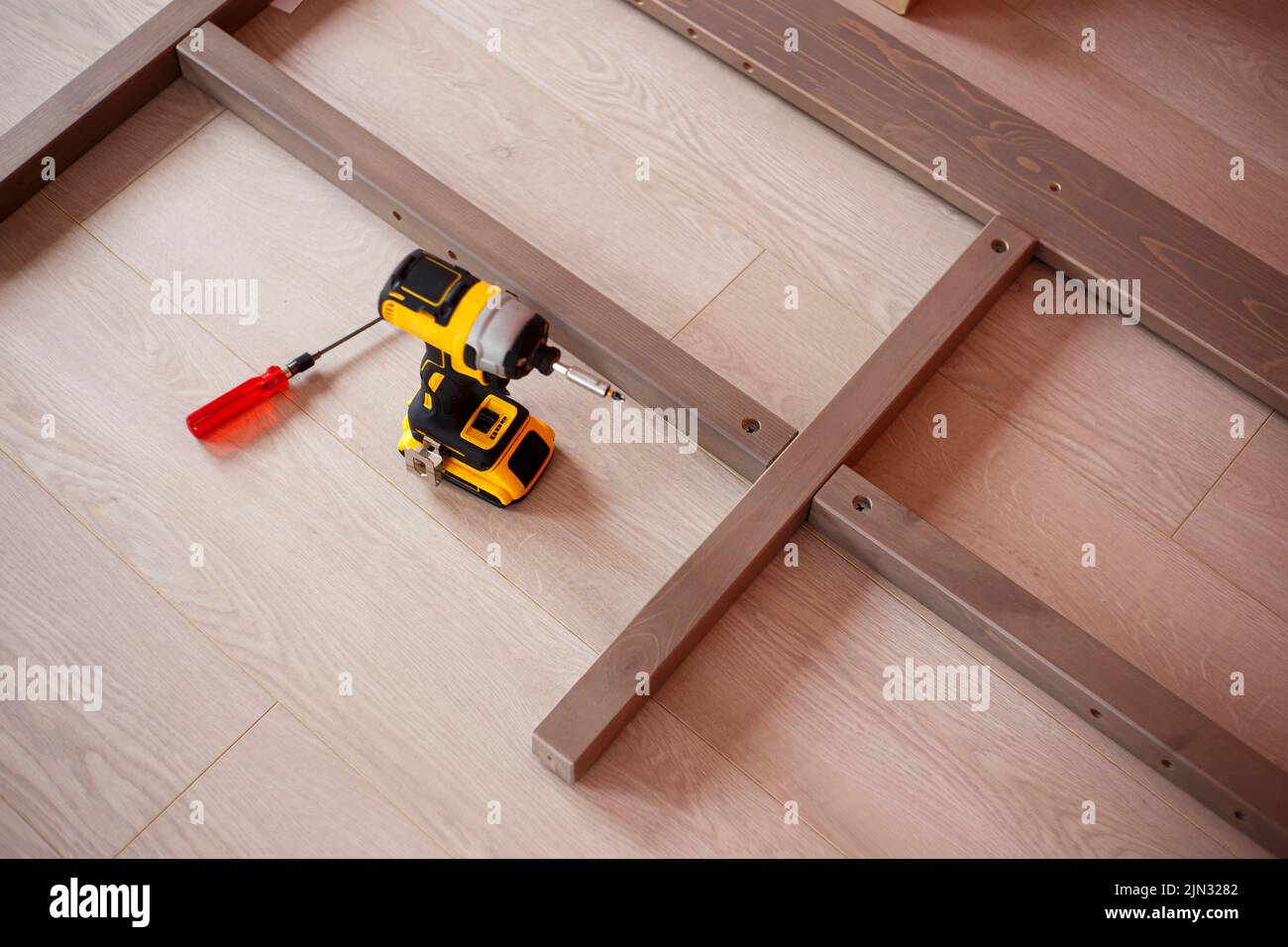 Assembling furniture at home. Home repairs Stock Photo