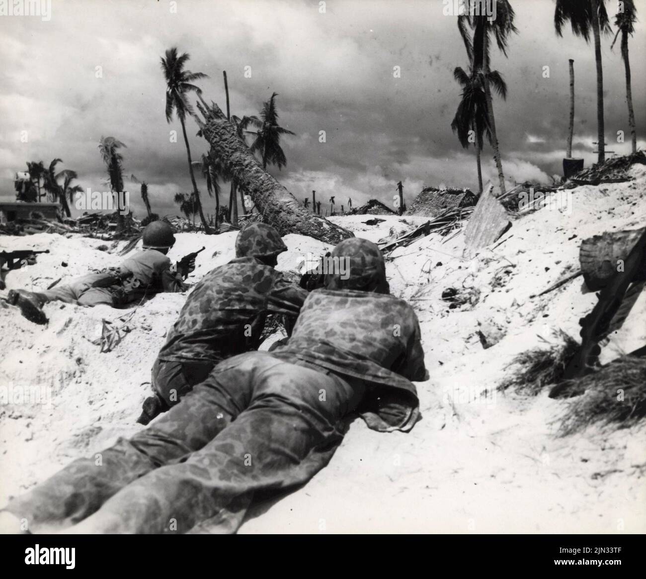 US Marines on Betio Island beach.The landings on Tarawa were part of the US offensive against the Pacific Islands held by Japan before preparing for an assault on the Japanese mainland. Stock Photo