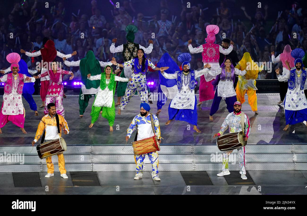 Performers dance to the music of Panjabi MC during the Closing Ceremony for the 2022 Commonwealth Games at the Alexander Stadium in Birmingham. Picture date: Monday August 8, 2022. Stock Photo
