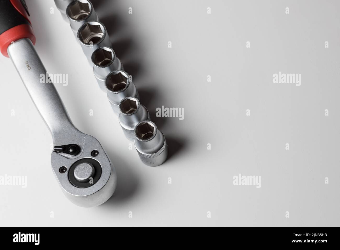 Manual metalworking tool. socket wrench isolated on white background