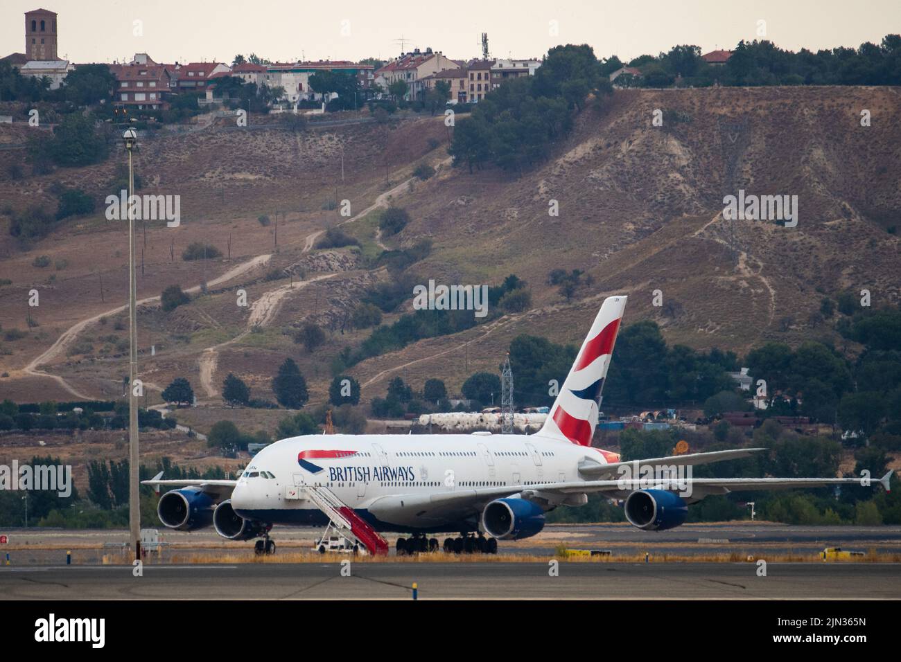 An Airbus 380 airplane of British Airways in seen on the runway at Adolfo Suarez Madrid Barajas Airport. Stock Photo