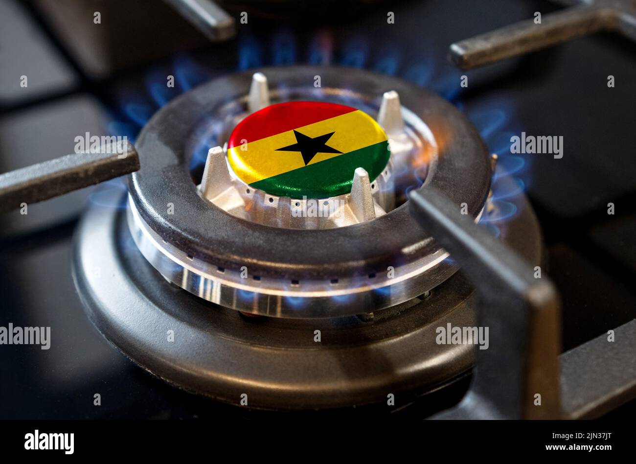 Gas import and export concept. A burning gas burner of a home stove, in