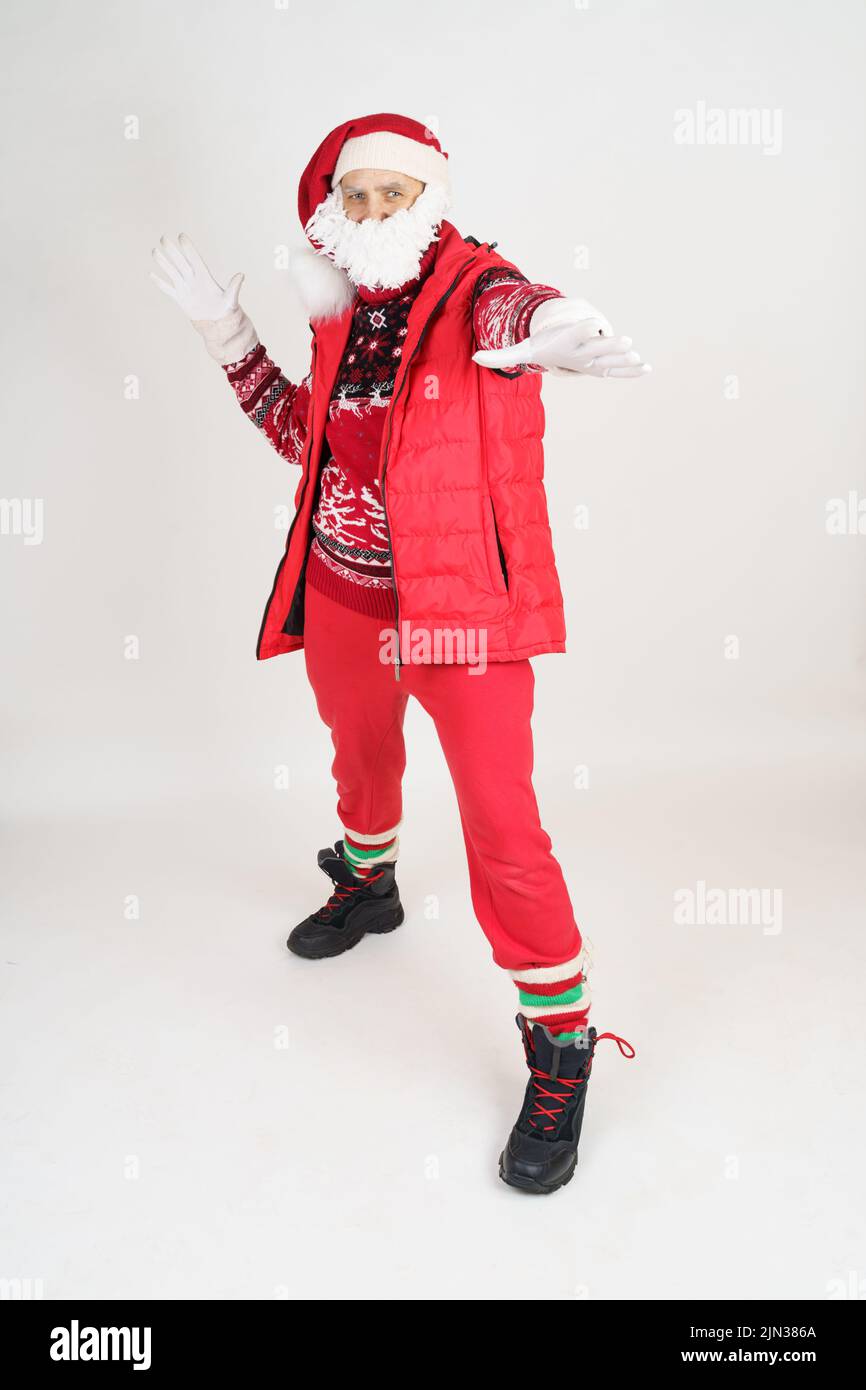 Christmas holidays concept. Cheerful Santa Claus shows hand gesture ...