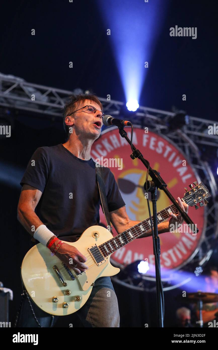 Damian O'Neill of The Undertones during the bands performance at Wickham festival, Hampshire, UK Stock Photo