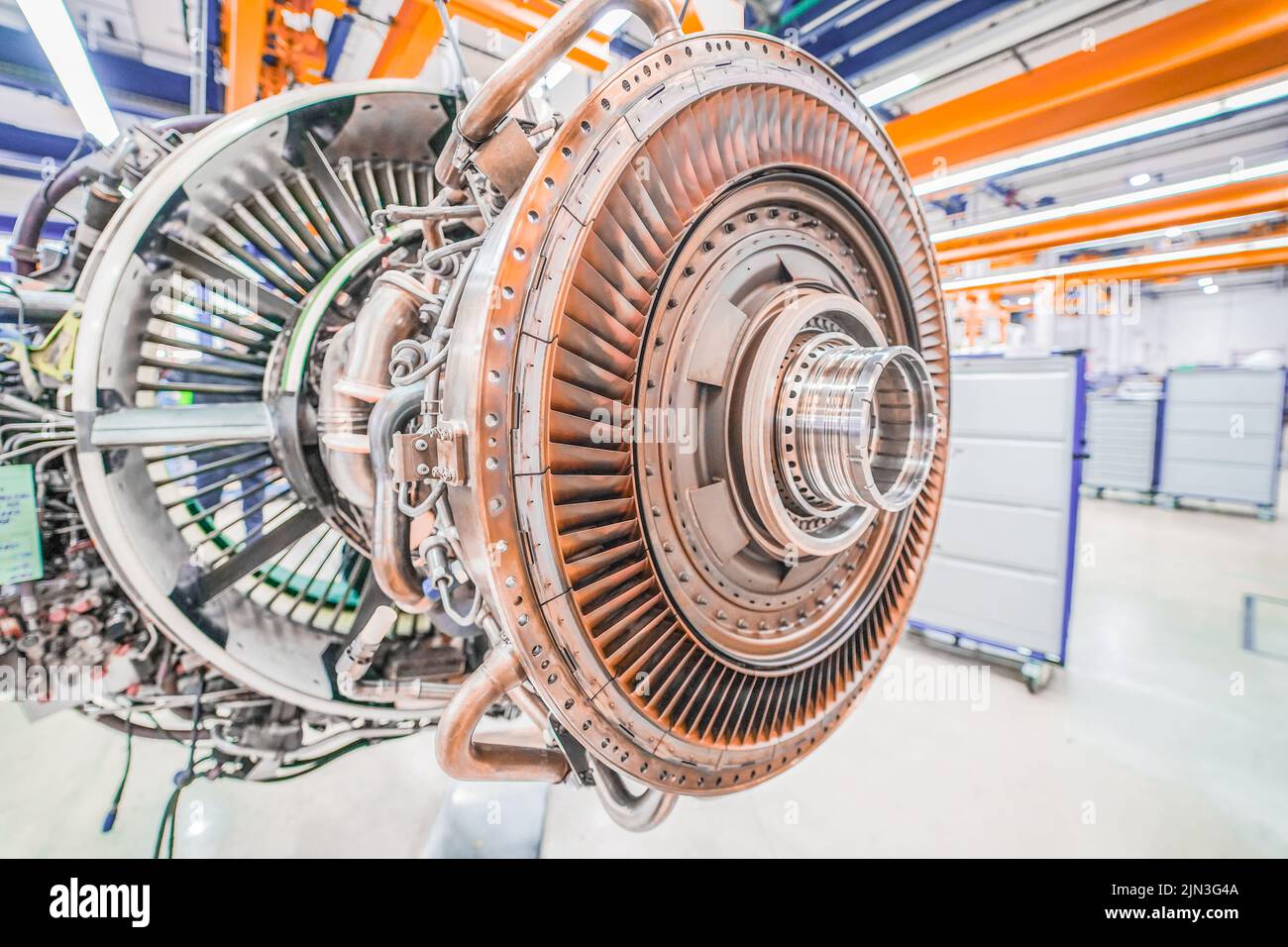 Aircraft engine parts separated during the disassembly process in the mechanic workshop Stock Photo