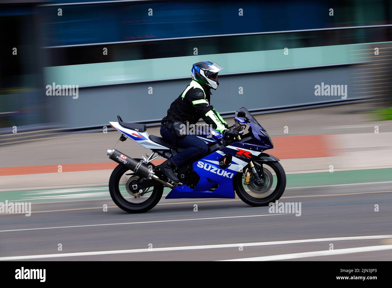 A motorcycle speeding through Leeds City Centre Stock Photo Alamy